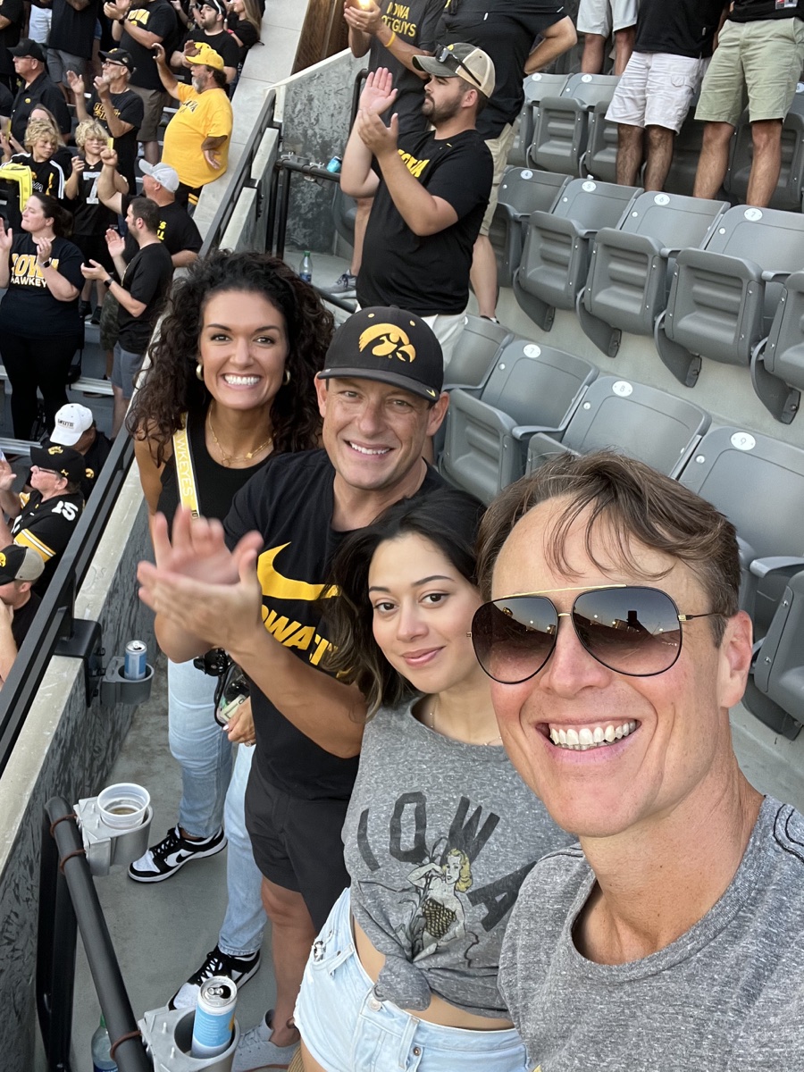 Kinnick Edge seating area with fans in the row